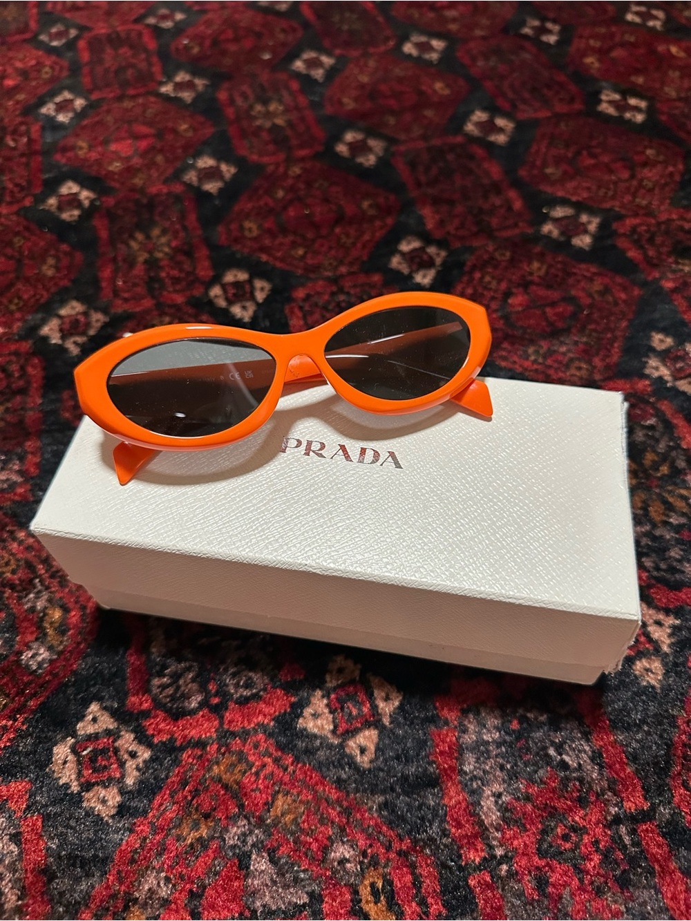 Prada Orange Cat-Eye Sunglasses
